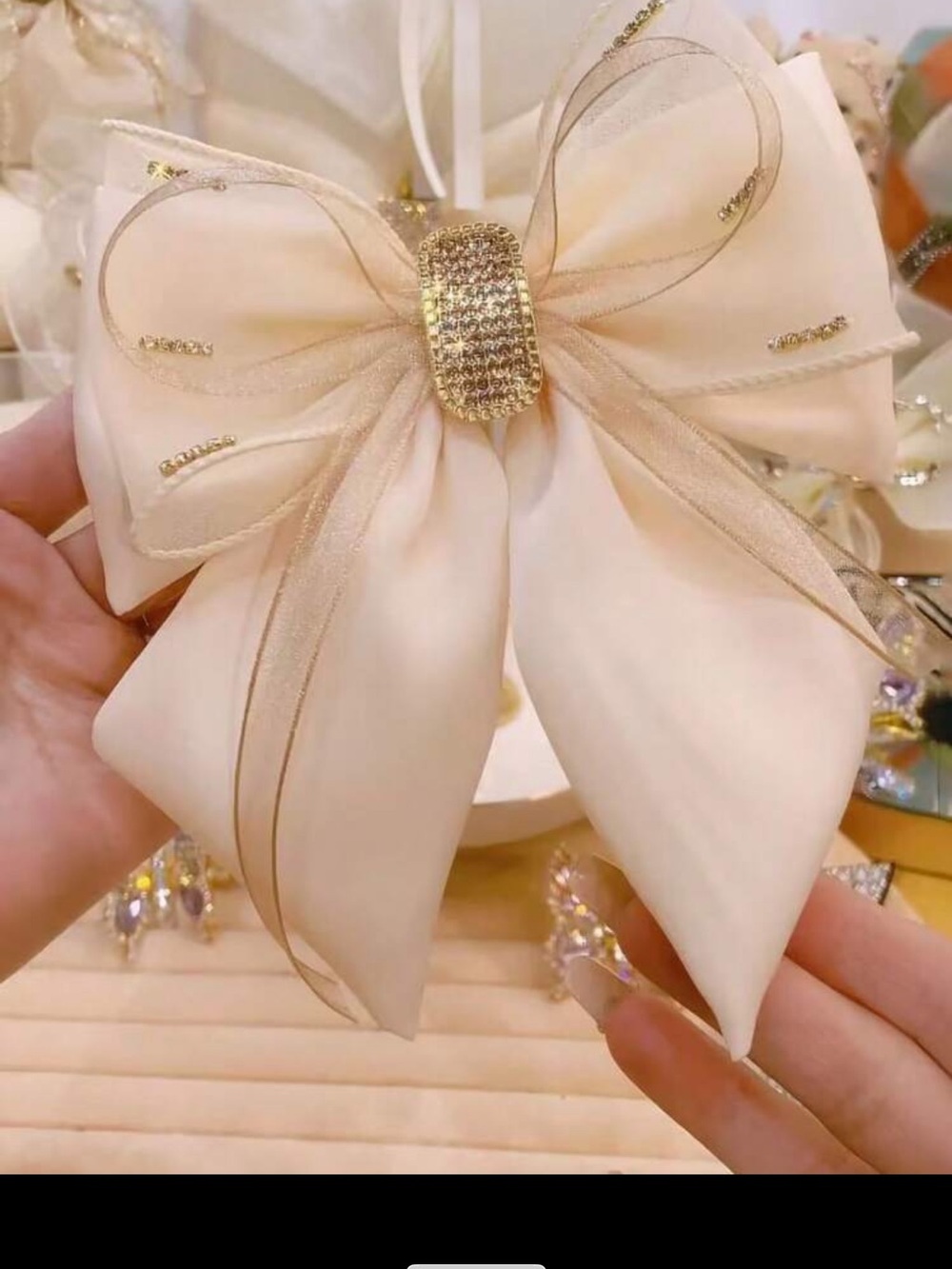 Elegant Cream Bow Hair Clip with Gold Rhinestone Accent